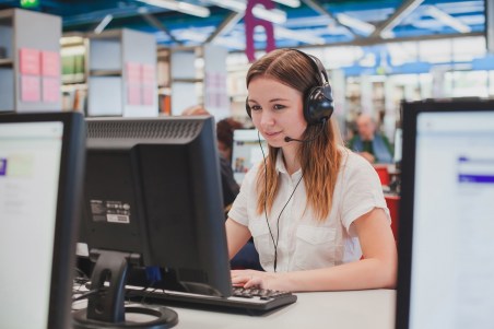 student working in computer class