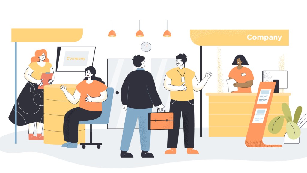 Teacher and exhibitor talking at an educational conference.